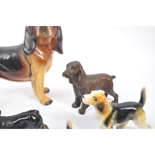 172 - Beswick - A collection of 20th Century vintage china porcelain figurines in the form of dogs compris... 