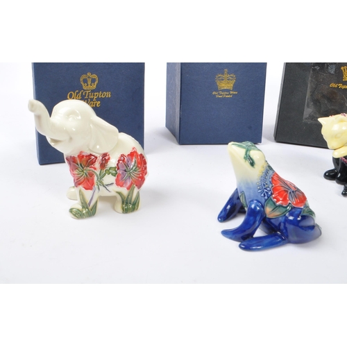 174 - Old Tupton Ware - A collection of five china hand painted Old Tupton Ware items to include figurines... 