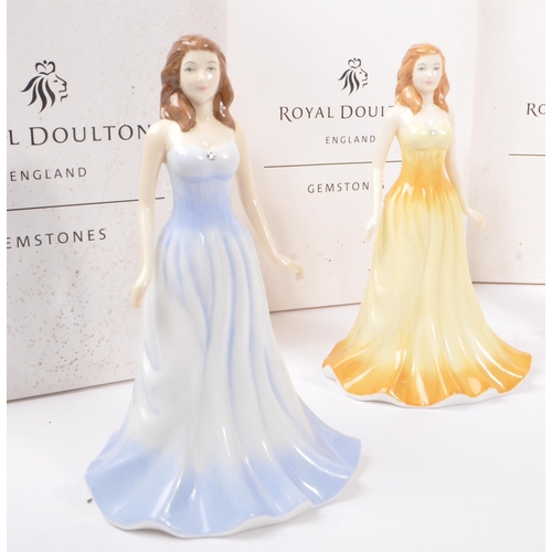 175 - Royal Doulton - A collection of five china porcelain figurines in the form of ladies in evening gown... 