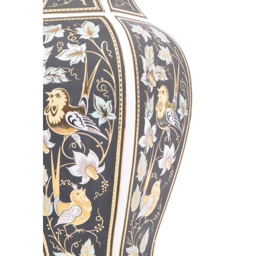 178 - A vintage 20th century Italian gilt decorated ceramic vase. The vase having a white ground with blac... 