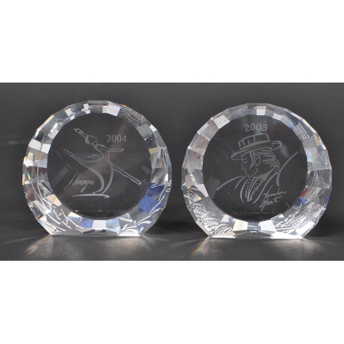 18 - Swarovski - A collection of boxed Swarovski crystal paperweights. The collection to include a total ... 