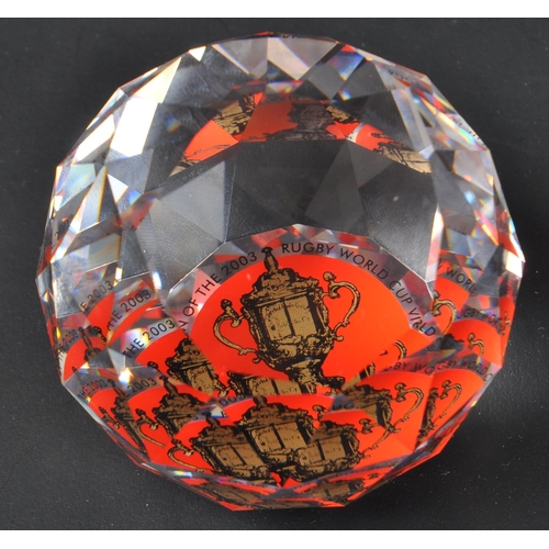 18 - Swarovski - A collection of boxed Swarovski crystal paperweights. The collection to include a total ... 