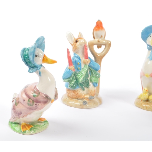 189 - Beatrix Potter / Sylvac - A collection of 20th Century vintage china / ceramic figurines comprising ... 