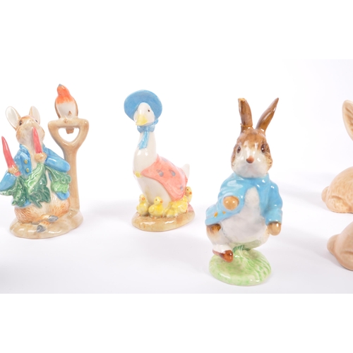 189 - Beatrix Potter / Sylvac - A collection of 20th Century vintage china / ceramic figurines comprising ... 