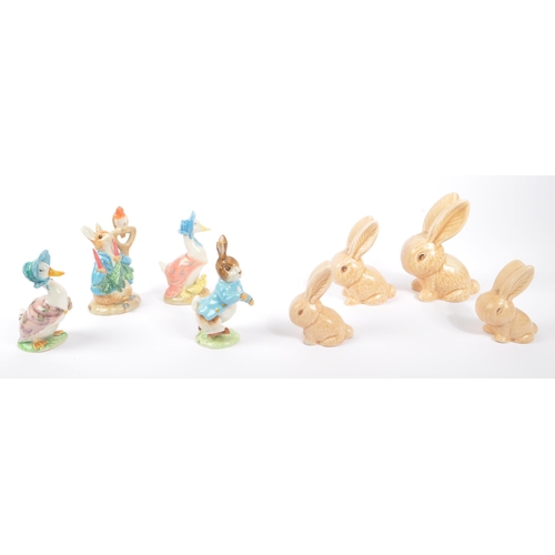 189 - Beatrix Potter / Sylvac - A collection of 20th Century vintage china / ceramic figurines comprising ... 