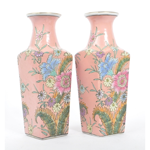 193 - A pair of 1950s mid 20th century Chinese porcelain vases. The vases having flared rim over waisted n... 