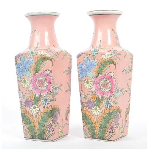 193 - A pair of 1950s mid 20th century Chinese porcelain vases. The vases having flared rim over waisted n... 