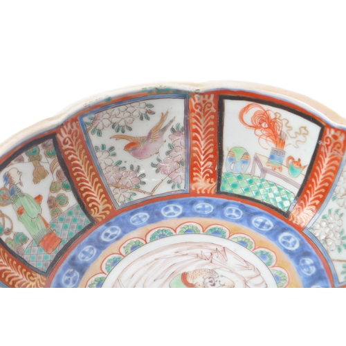 194 - A 19th century Meiji Japanese hand painted bowl. The bowl having scalloped vignettes of figural scen... 