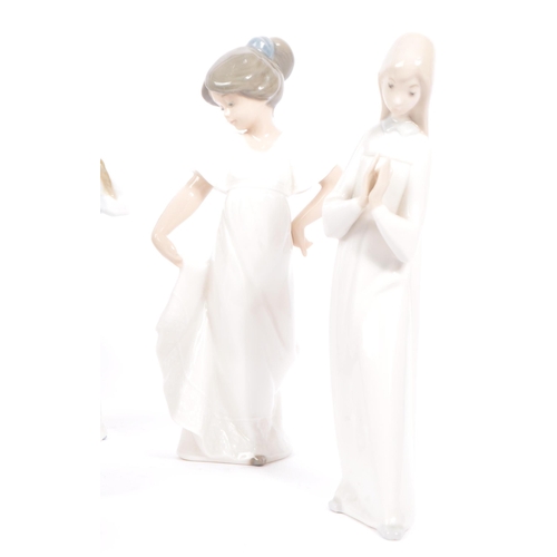 201 - Lladro / Nao - A collection of Lladro & Nao china figures, alongside other similar examples. The col... 