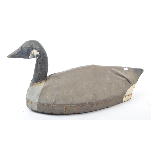 210 - An early 20th Century circa. 1920s carved wooden painted decoy duck with canvas coating to body. Mea... 