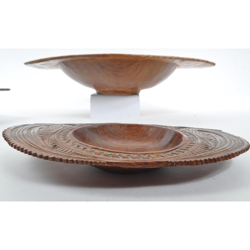 213 - A collection of three vintage 20th century Trobriand Island - Papua New Guinea wooden carved bowls. ... 