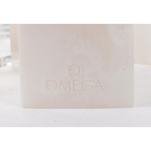 214 - Omega - An extensive collection of Omega point of sale advertisement display blocks / stands. The co... 