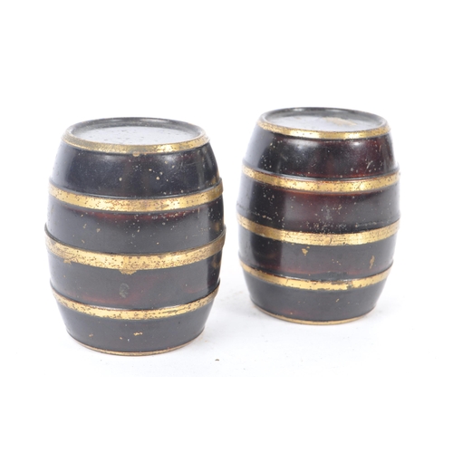 221 - A pair of early 19th century circa 1800 travel inkwell. In the form of barrels with ebonised ground ... 