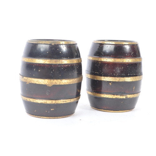 221 - A pair of early 19th century circa 1800 travel inkwell. In the form of barrels with ebonised ground ... 