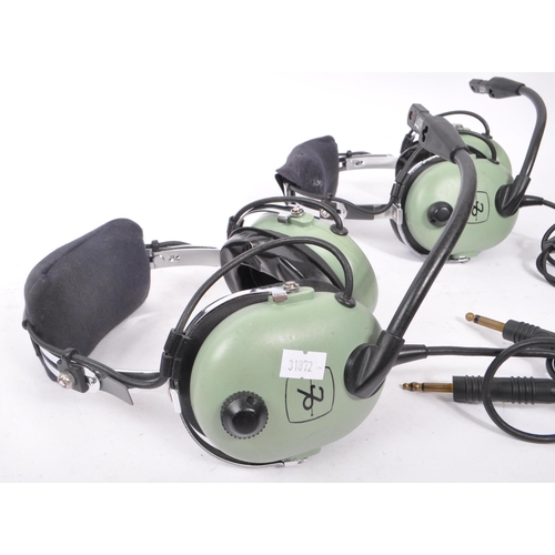 222 - Aviation Interest - David Clark - Two David Clark Company aviation headsets having light green ear p... 