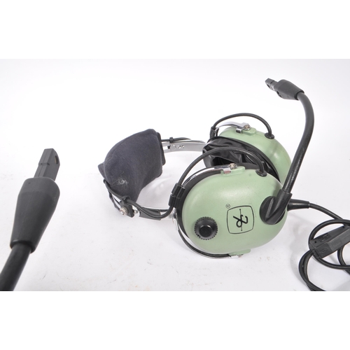 222 - Aviation Interest - David Clark - Two David Clark Company aviation headsets having light green ear p... 