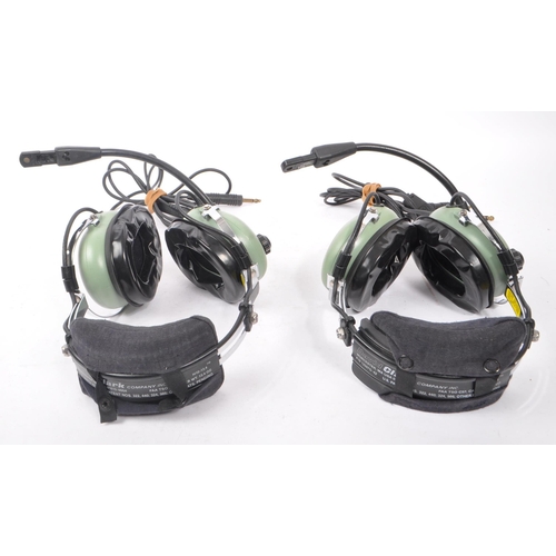 222 - Aviation Interest - David Clark - Two David Clark Company aviation headsets having light green ear p... 