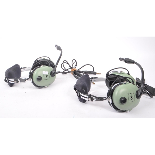 222 - Aviation Interest - David Clark - Two David Clark Company aviation headsets having light green ear p... 