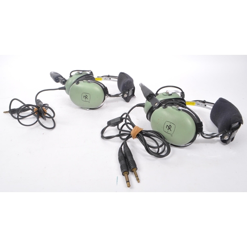 222 - Aviation Interest - David Clark - Two David Clark Company aviation headsets having light green ear p... 