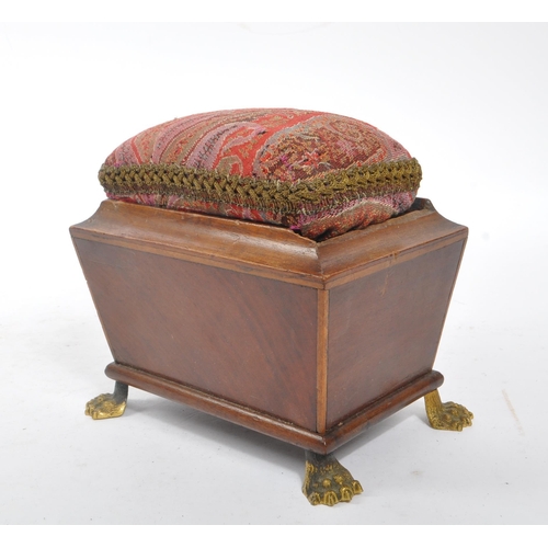 227 - A George III early 19th century mahogany sewing companion / pin cushion. Sarcophagus form with drop ... 