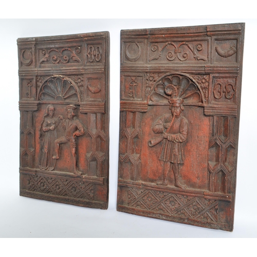 229 - A pair of 17th century style figural panels, oak effect resin moulds one depicting a courting couple... 