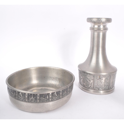 232 - Haugrud Norway - A collection of mid 20th century Haugrud Norway pewter tableware pieces. The collec... 