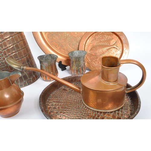 233 - A collection of early 20th century copper decorative items / curios. The collection to include a tal... 