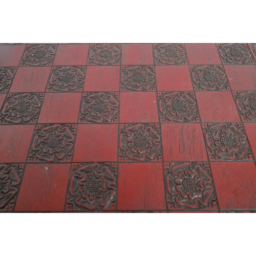 241 - A mid 20th century circa 1960s Chinese red lacquered wooden chess board. The chess board featuring a... 