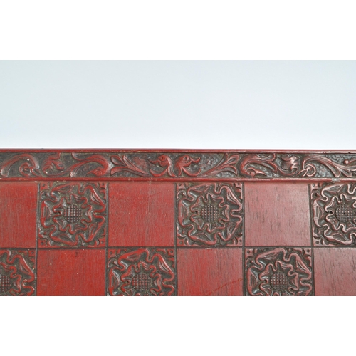 241 - A mid 20th century circa 1960s Chinese red lacquered wooden chess board. The chess board featuring a... 