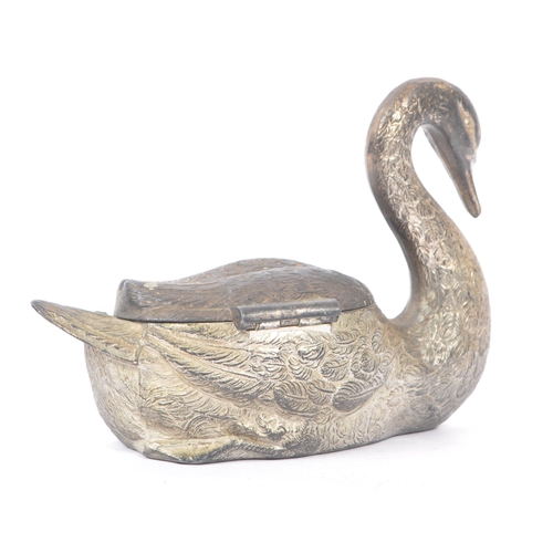 243 - An early 20th century silver plated swan jewellery casket. The box in the form of a swan, with relie... 