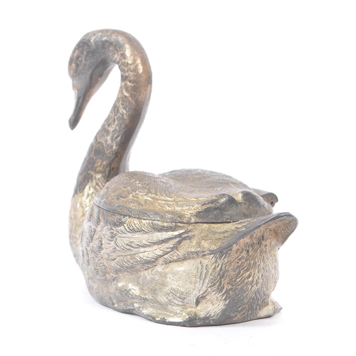 243 - An early 20th century silver plated swan jewellery casket. The box in the form of a swan, with relie... 