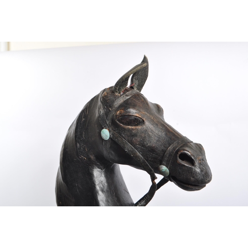 244 - Manner of Liberty - An early 20th century manner of Liberty leather rearing horse decoration figure.... 