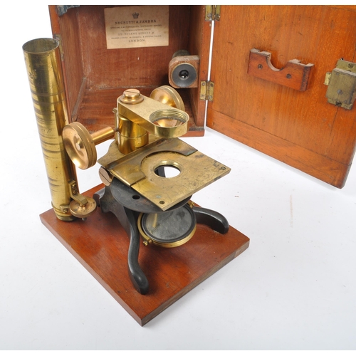 245 - Negretti & Zambra - A circa 1900 Negretti & Zambra brass scientific microscope. The microscope impre... 