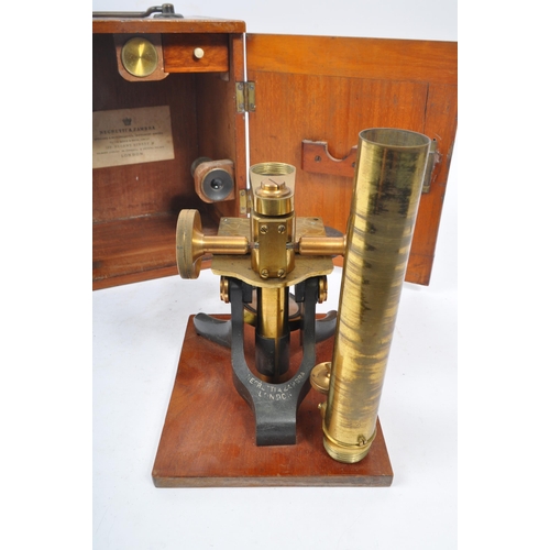 245 - Negretti & Zambra - A circa 1900 Negretti & Zambra brass scientific microscope. The microscope impre... 