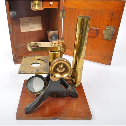 245 - Negretti & Zambra - A circa 1900 Negretti & Zambra brass scientific microscope. The microscope impre... 