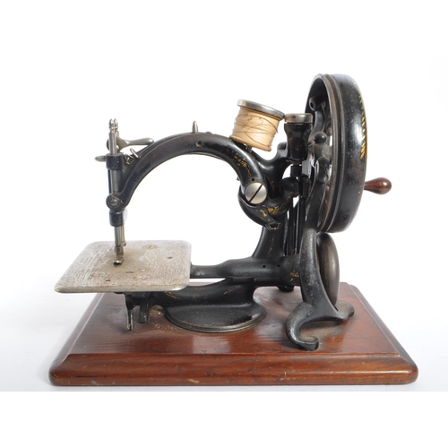 257 - Willcox & Gibbs - An early 20th century Willcox & Gibbs sewing machine. The sewing machine mounted u... 