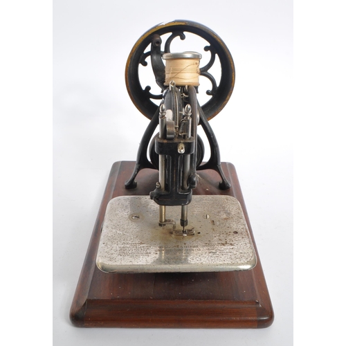 257 - Willcox & Gibbs - An early 20th century Willcox & Gibbs sewing machine. The sewing machine mounted u... 