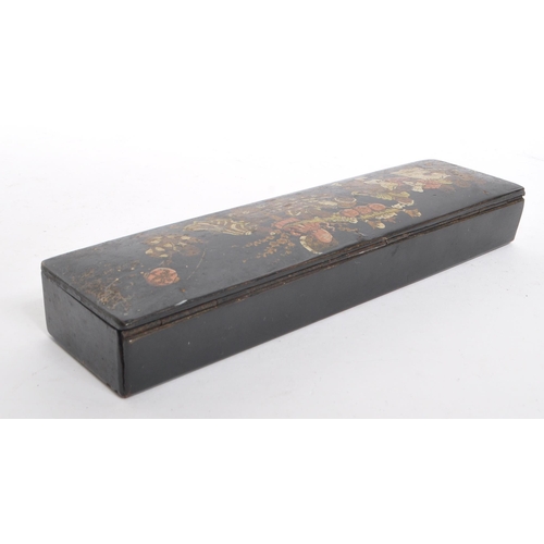 258 - An early 20th century circa. 1920s Japanese lacquered pen box. The pen box having black lacquered fi... 