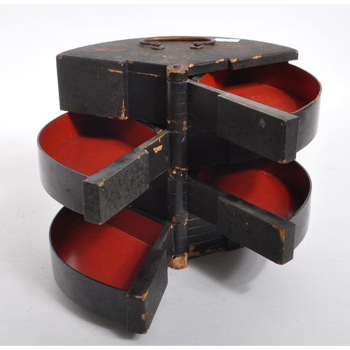 259 - An early 20th century Japanese jewellery box. The box featuring a rounded back, with relief patterni... 