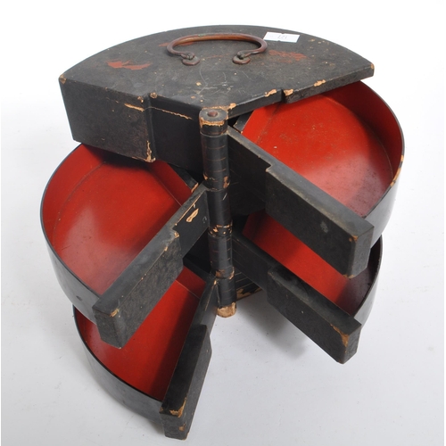 259 - An early 20th century Japanese jewellery box. The box featuring a rounded back, with relief patterni... 