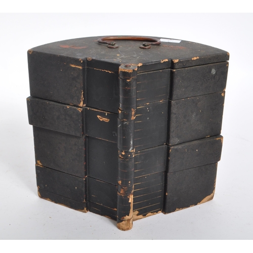 259 - An early 20th century Japanese jewellery box. The box featuring a rounded back, with relief patterni... 