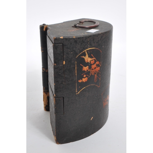 259 - An early 20th century Japanese jewellery box. The box featuring a rounded back, with relief patterni... 