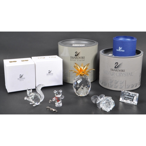 26 - Swarovski - A collection of boxed Swarovski crystal figures and ornaments. The collection to include... 