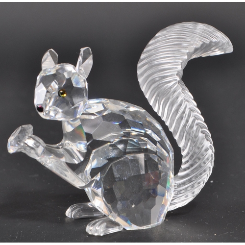 26 - Swarovski - A collection of boxed Swarovski crystal figures and ornaments. The collection to include... 