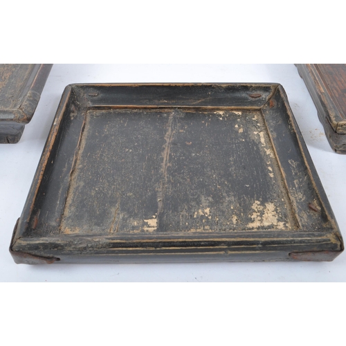 261 - Three 19th century Chinese wooden plant stands. The stands each of square form, with two raised on s... 