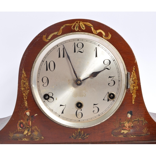 262 - Two early 20th century British ' Japanned ' mantel clocks. The larger of the two clocks having a tam... 