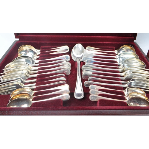 263 - Viners - Two vintage 20th century silver plated cutlery canteens to include Viners set with traditio... 