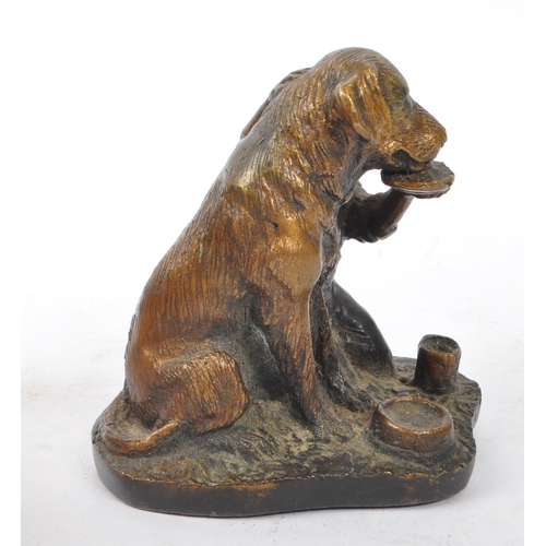 269 - Schultz - A bronze figure in the form of a boy feeding dog upon base signed ' Schultz '. The dog in ... 