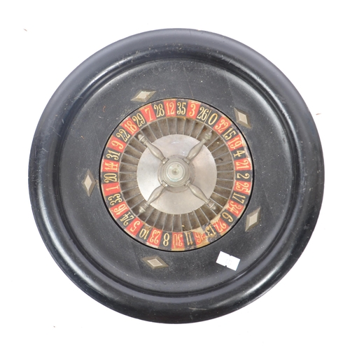 272 - An early 20th Century French roulette wheel signed JAL 24 and engraved 4611 to base. Measuring appro... 