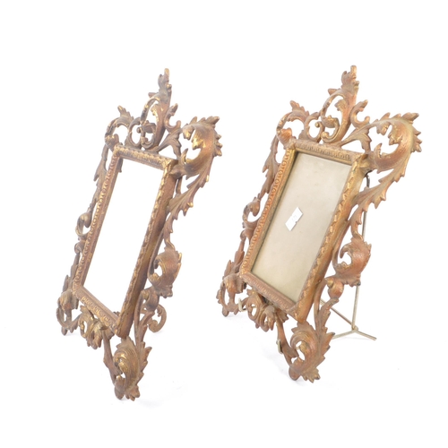 276 - A pair of 19th Century brass gilded rococo style picture frames of rectangular form having ornate ac... 